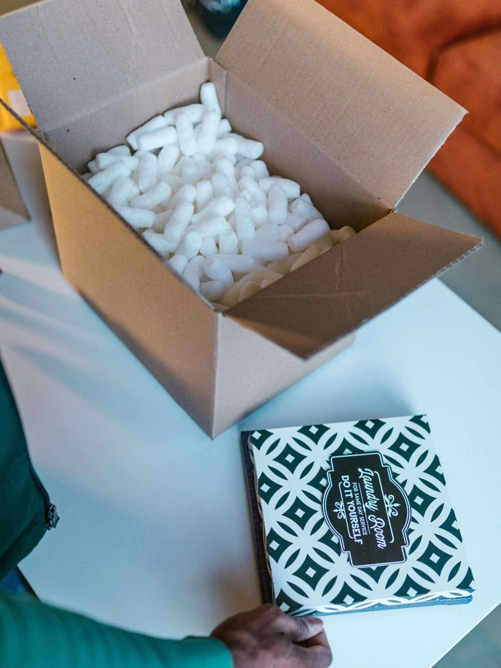 open cardboard box with packing peanuts